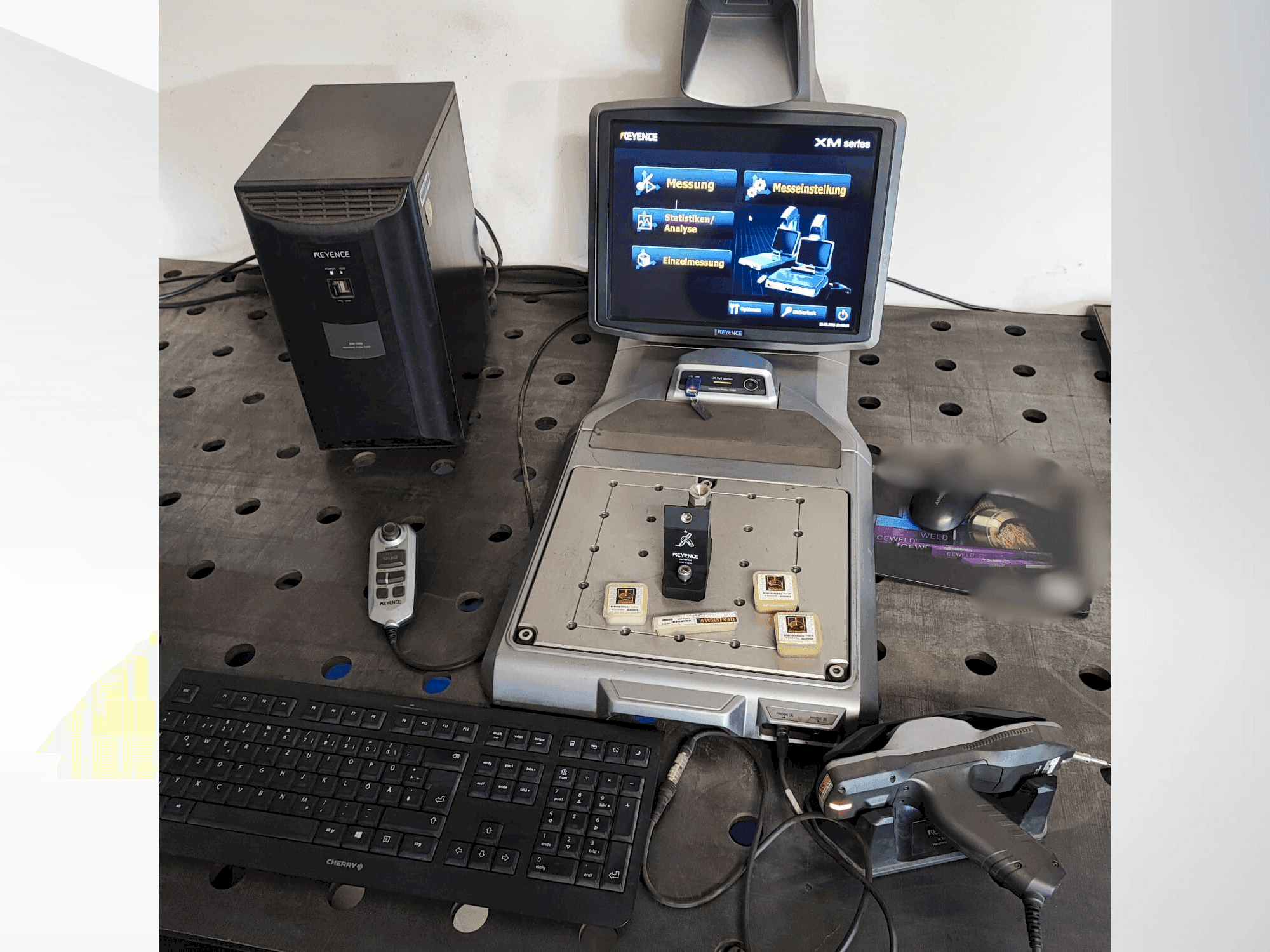 Front view of KEYENCE XM-1000 machine