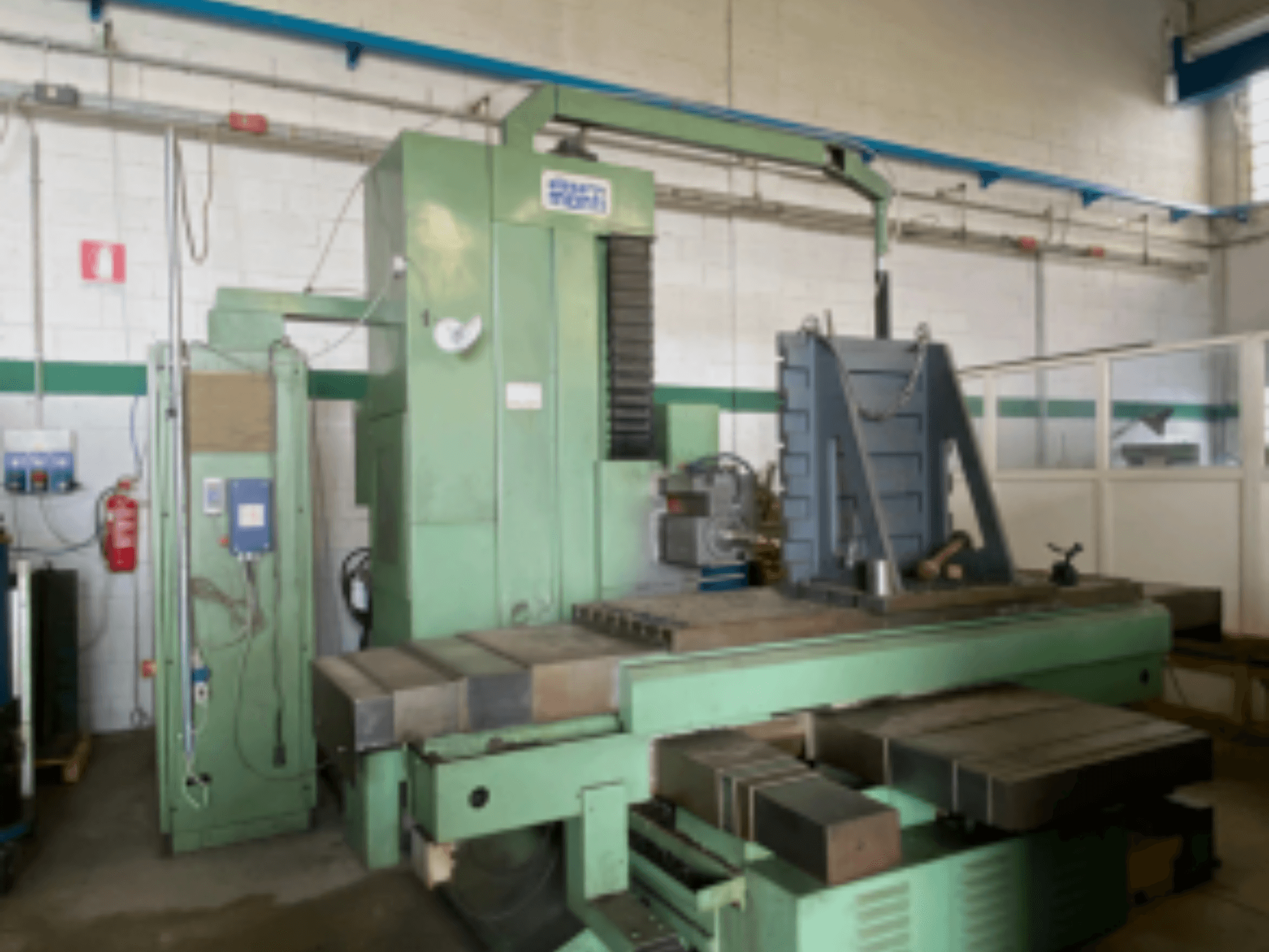 Alesa Monti MAF45 horizontal machining centre in a workshop, side view showing control panel and large worktable.