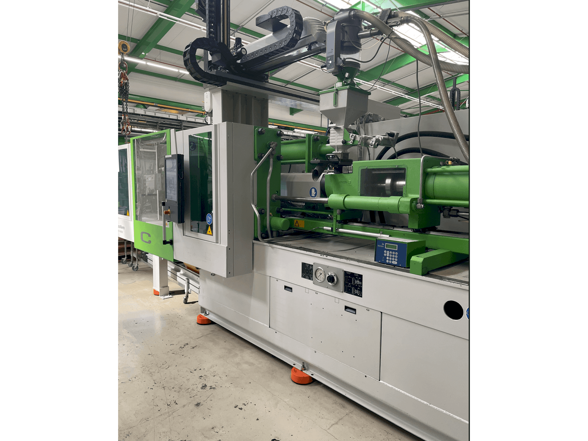 Front view of Krauss Maffei KM 200-1400CM machine