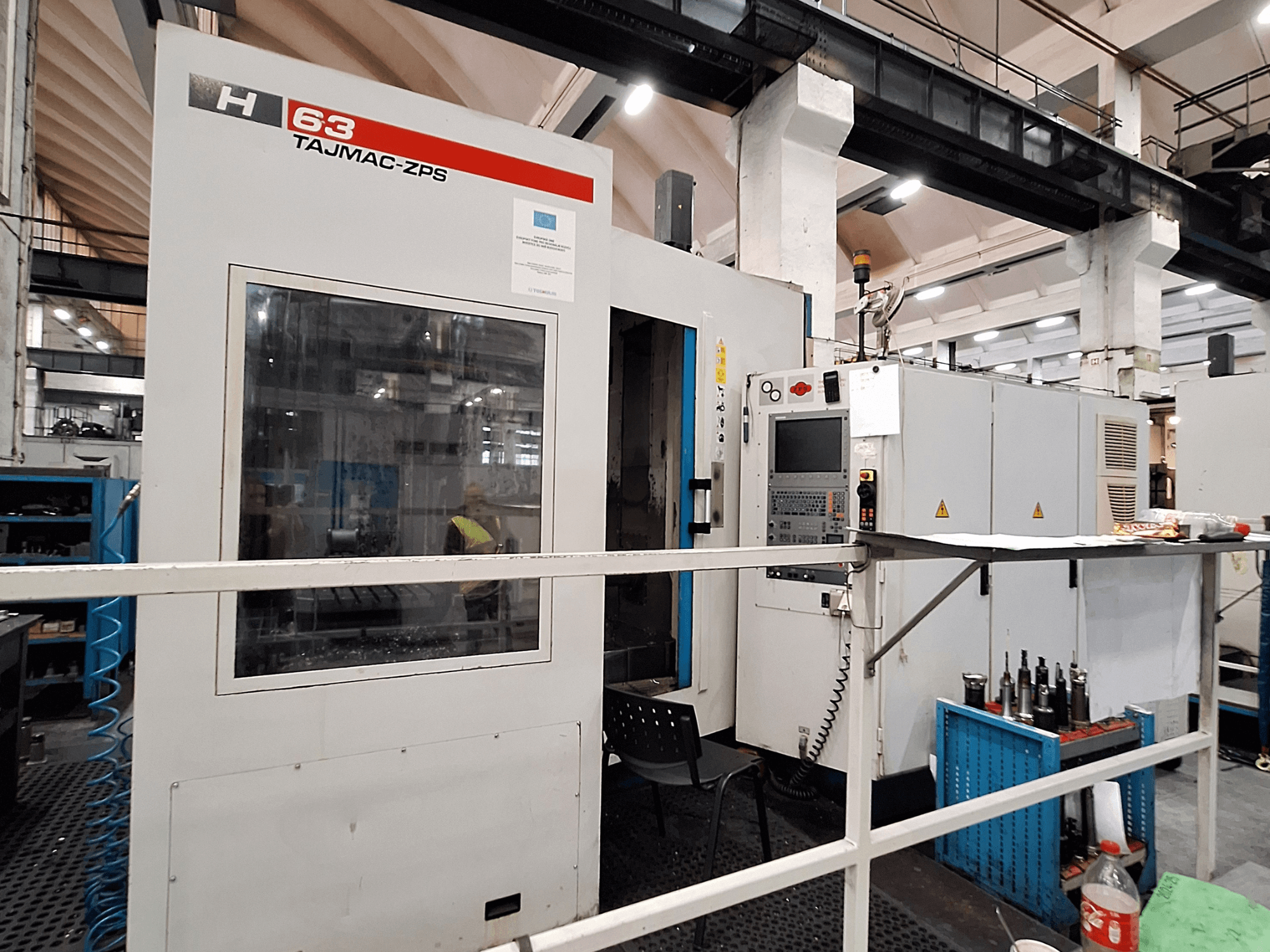 TAJMAC-ZPS H 63 Standard horizontal machining centre, front view showcasing control panel and machining area.
