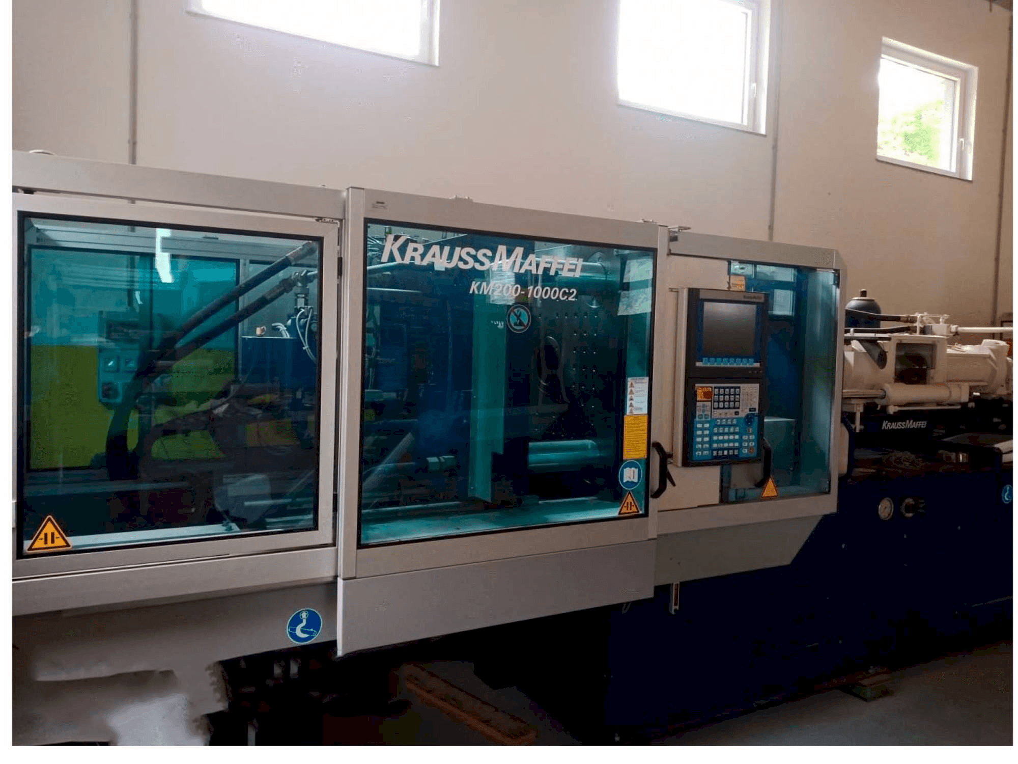 Front view of Krauss Maffei KM 200/1000 machine