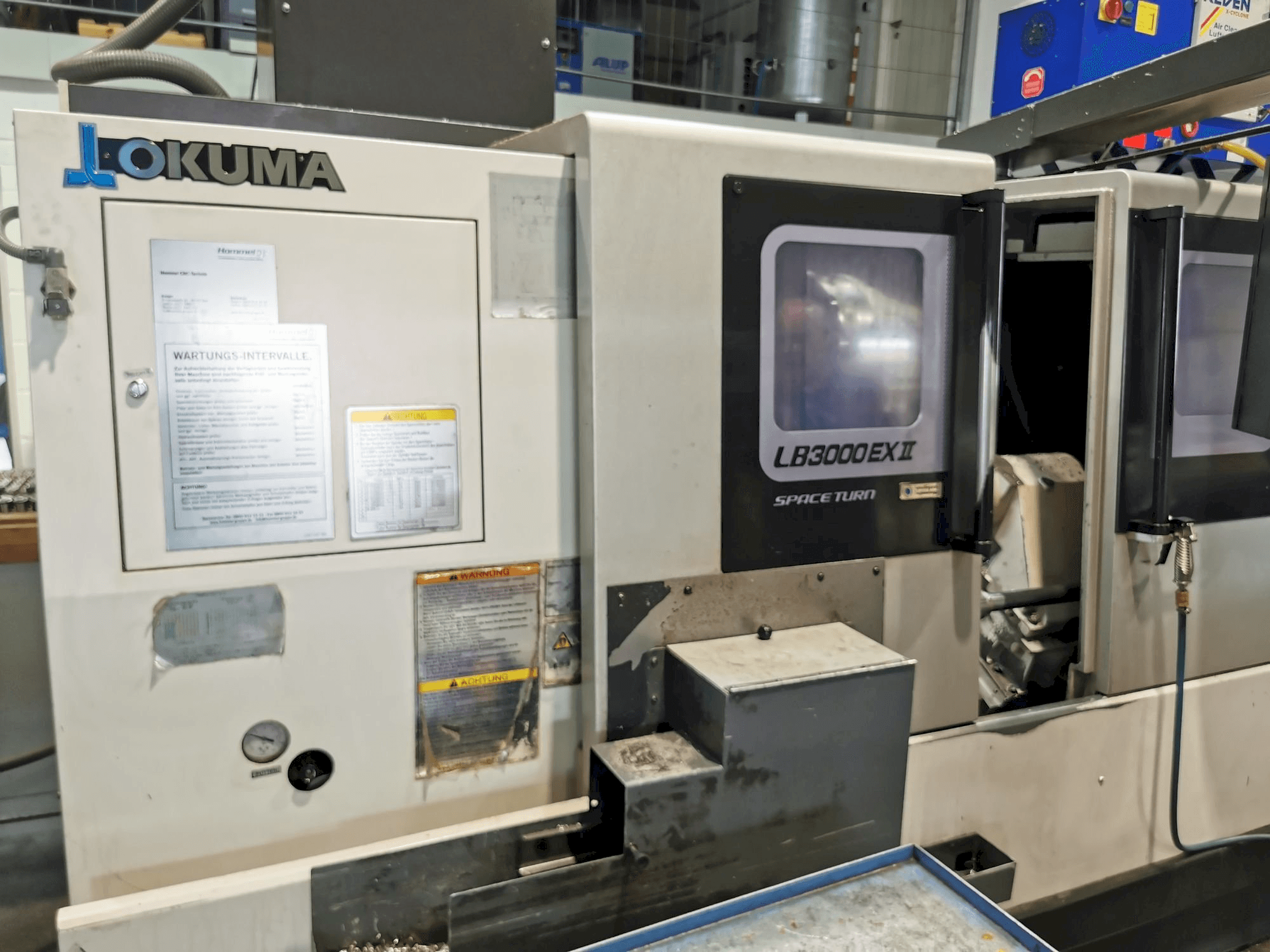 Front view of Okuma LB3000ll EX MC 1000 machine