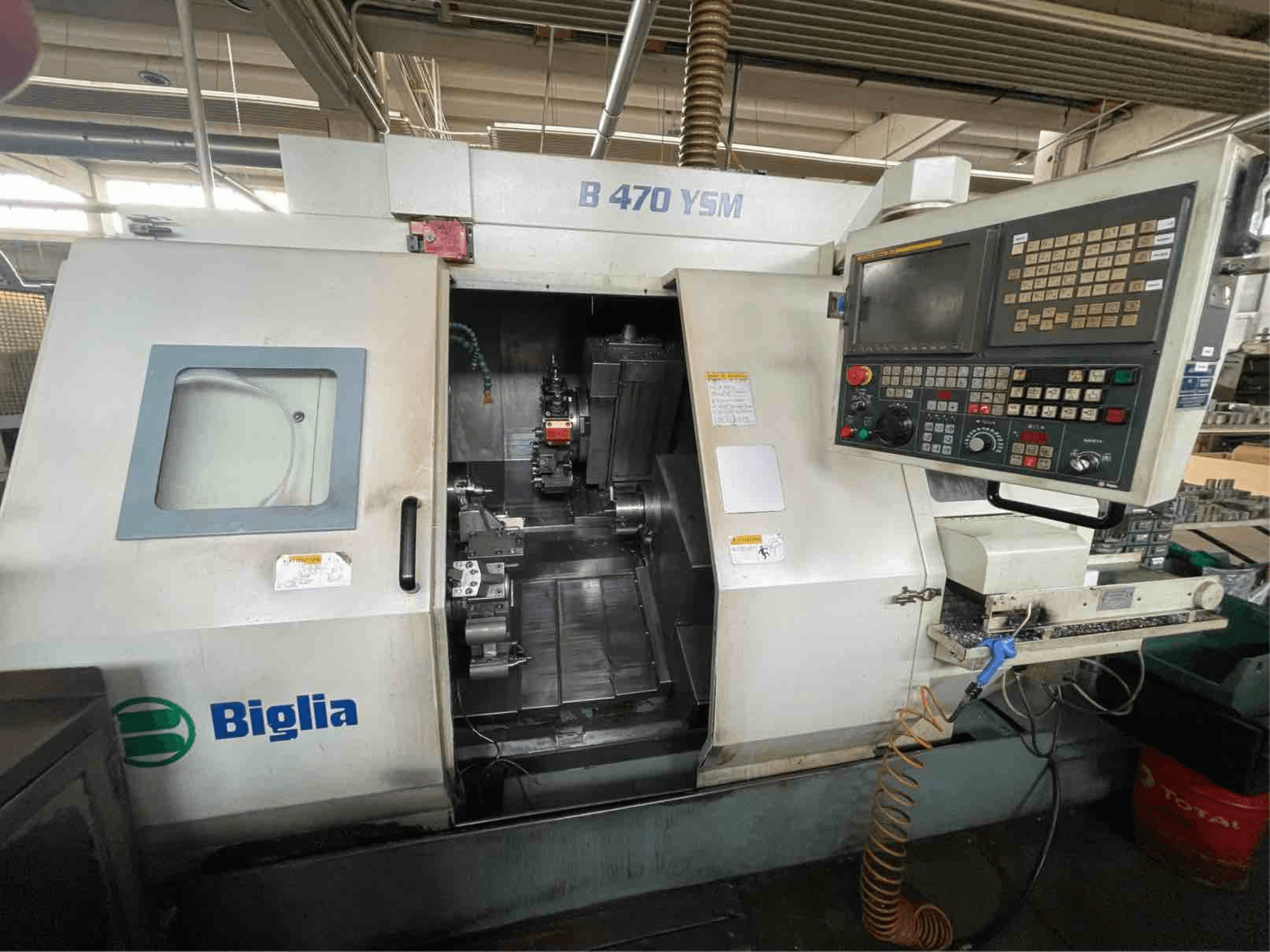 Biglia B 470 YSM horizontal turning machine, front view, showcasing control panel and open access for machining.