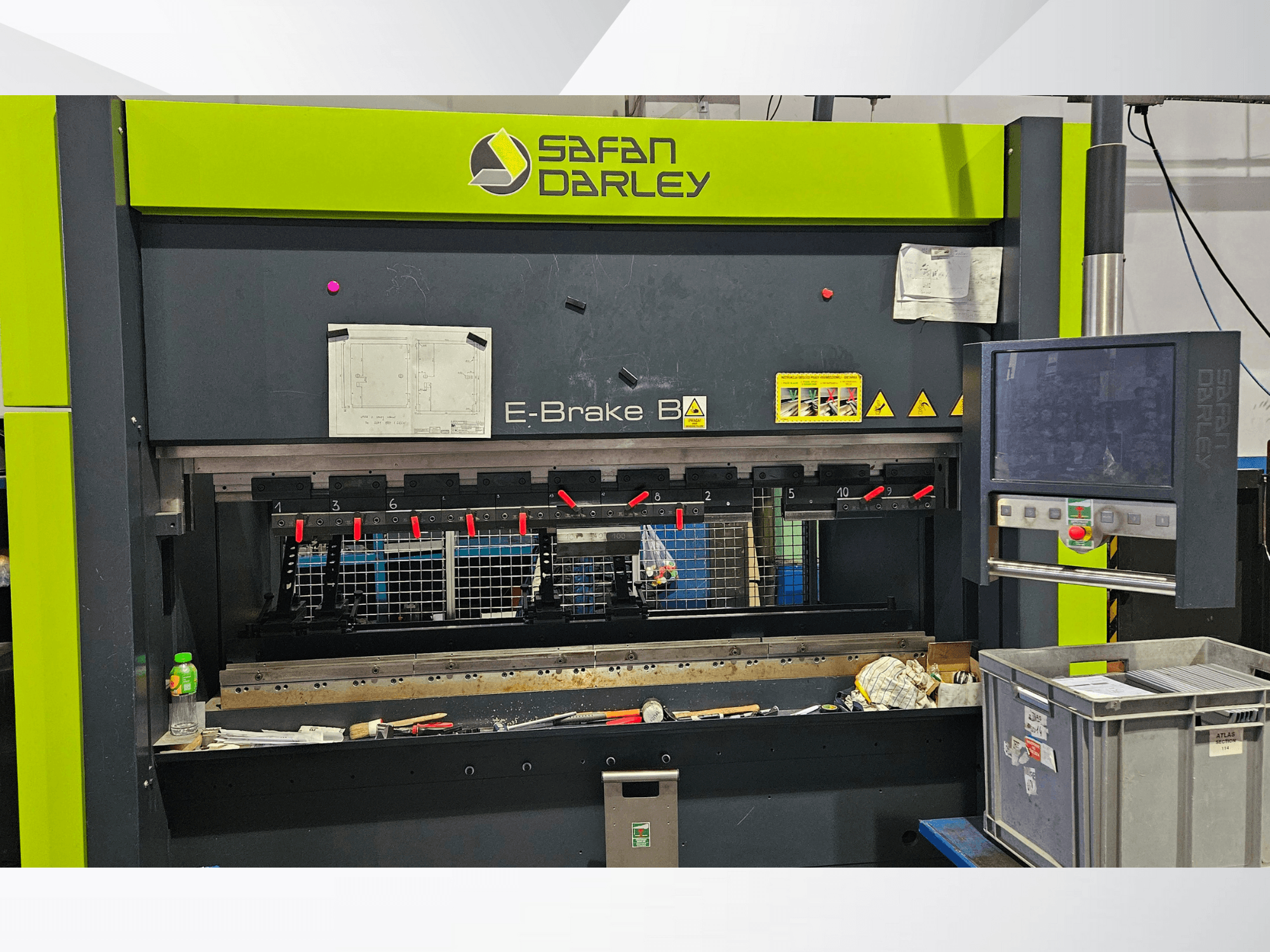 Safan Darley E-Brake B4 hydraulic press brake in front view, featuring controls, safety guards, and various clamps.