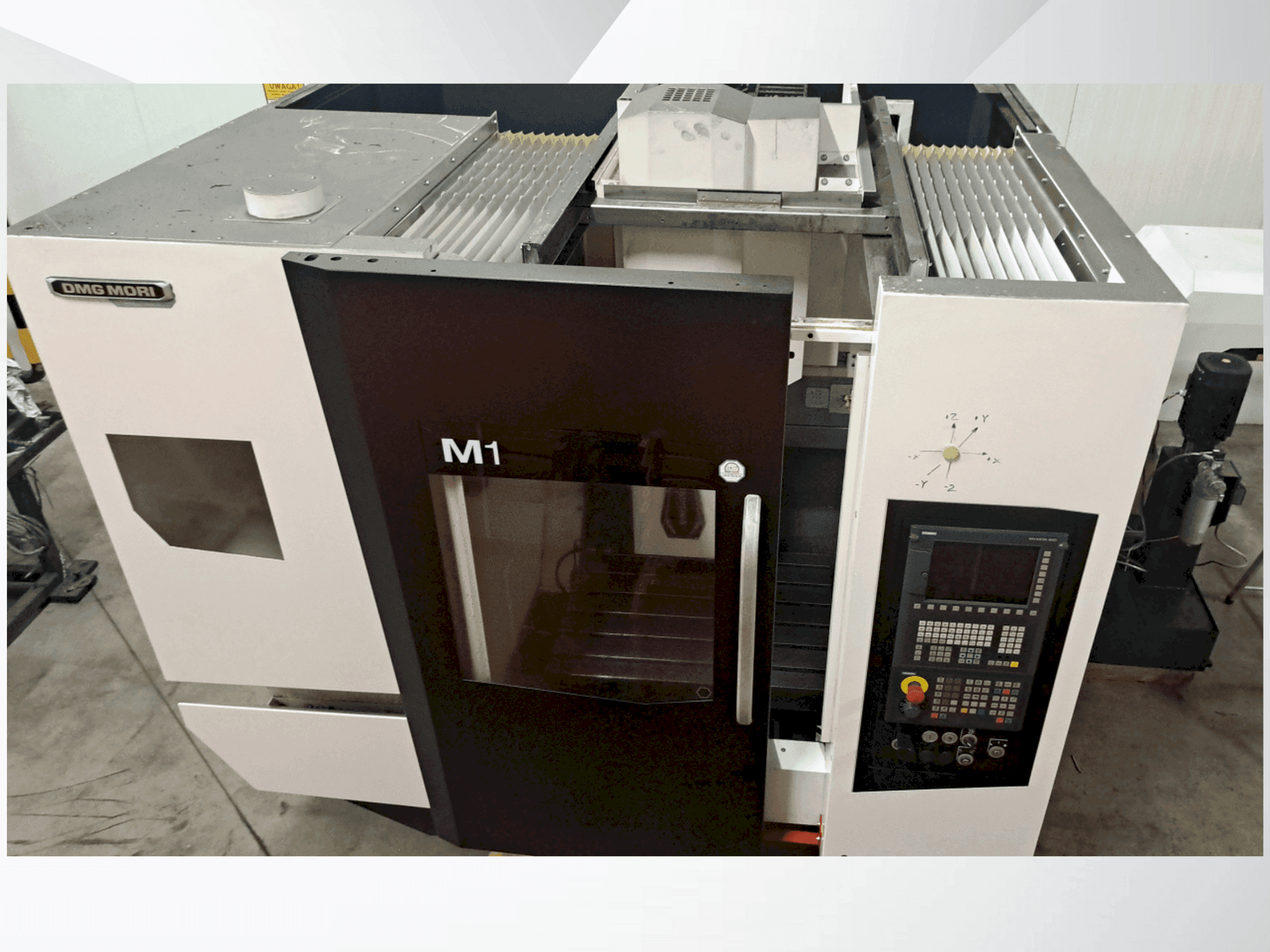 Front view of DMG MORI M1 PRO machine