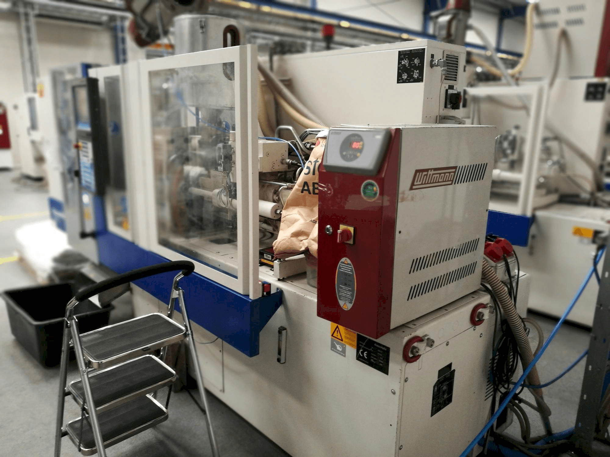 Front view of Krauss Maffei KM 35-55 CX machine