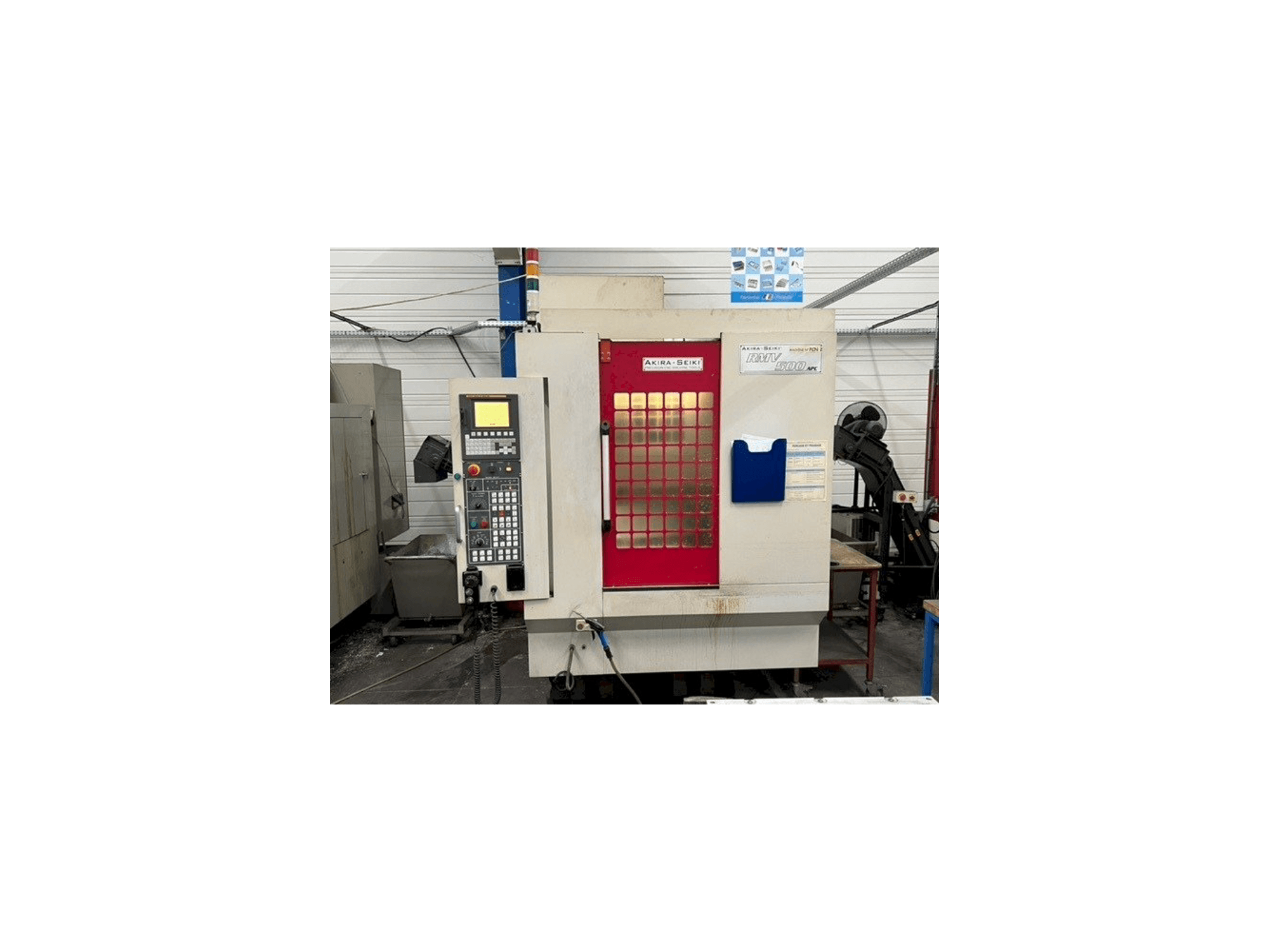 Front view of Akira Seiki RMV500 APC machine