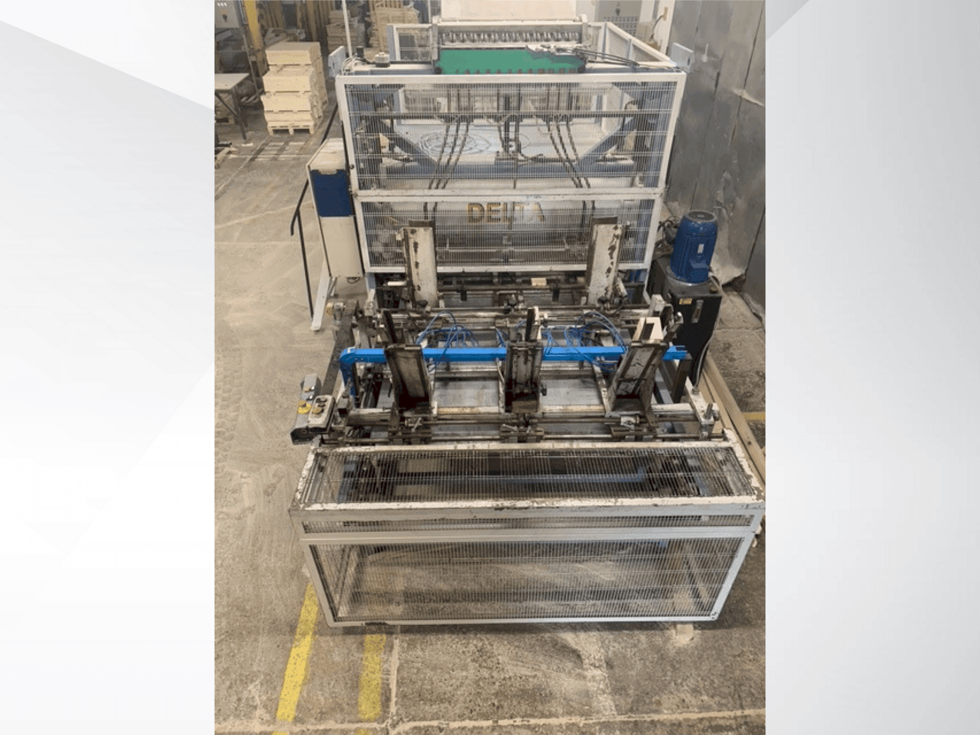Front view of DELTA pallet nailing machine line machine