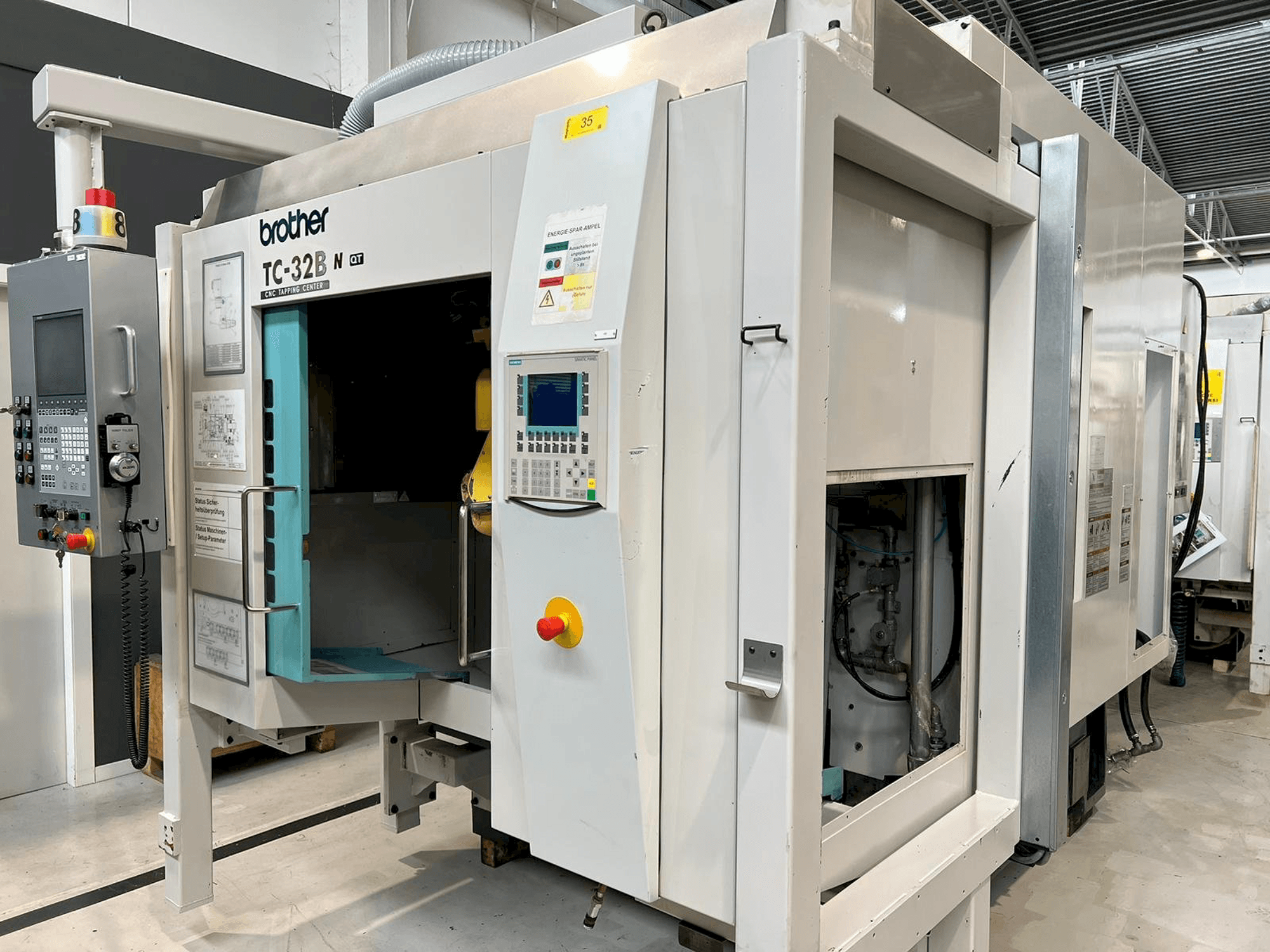 Front view of Brother TC-32BN QT machine