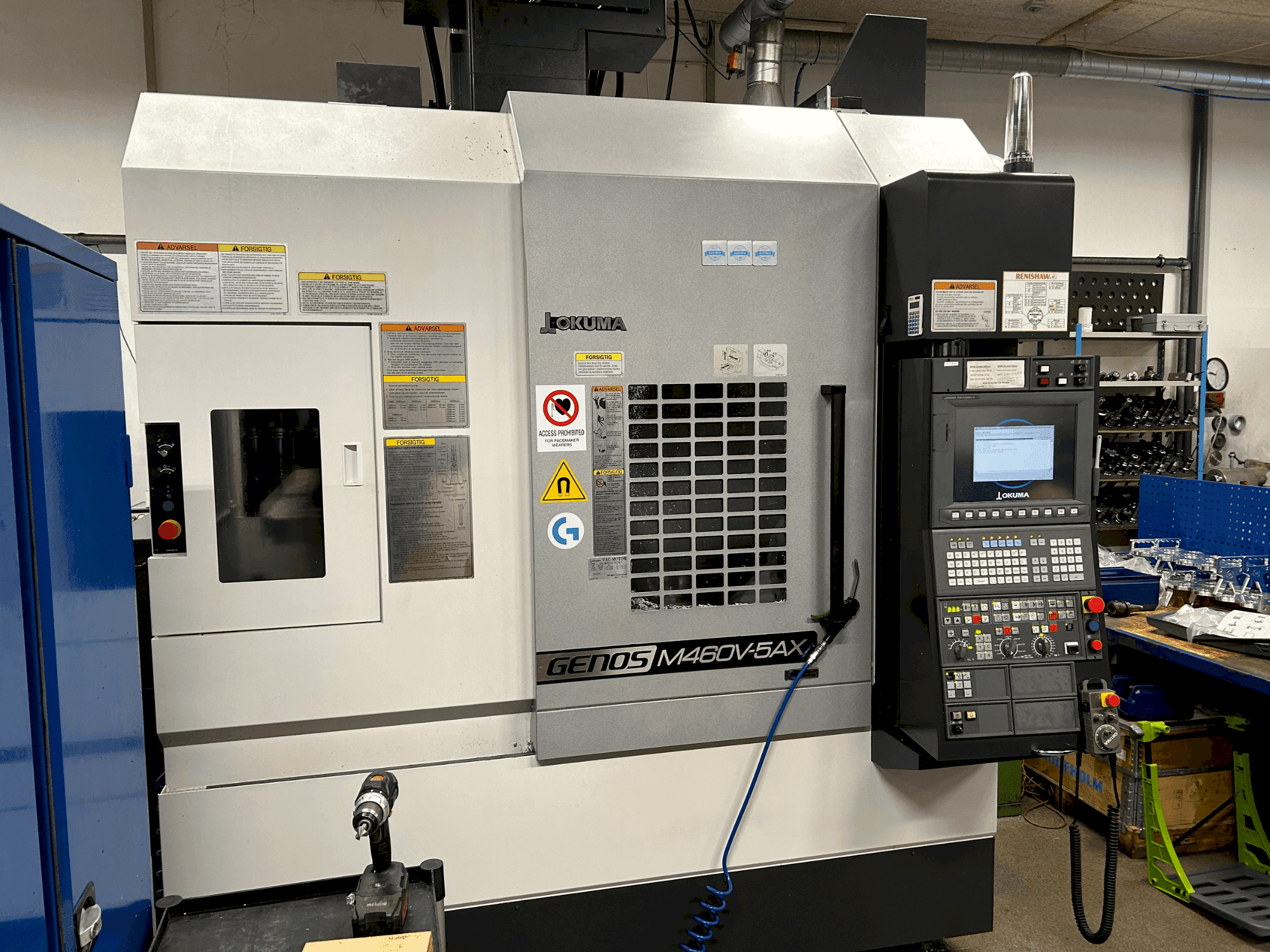 Front view of Okuma GENOS M460V-5AX machine