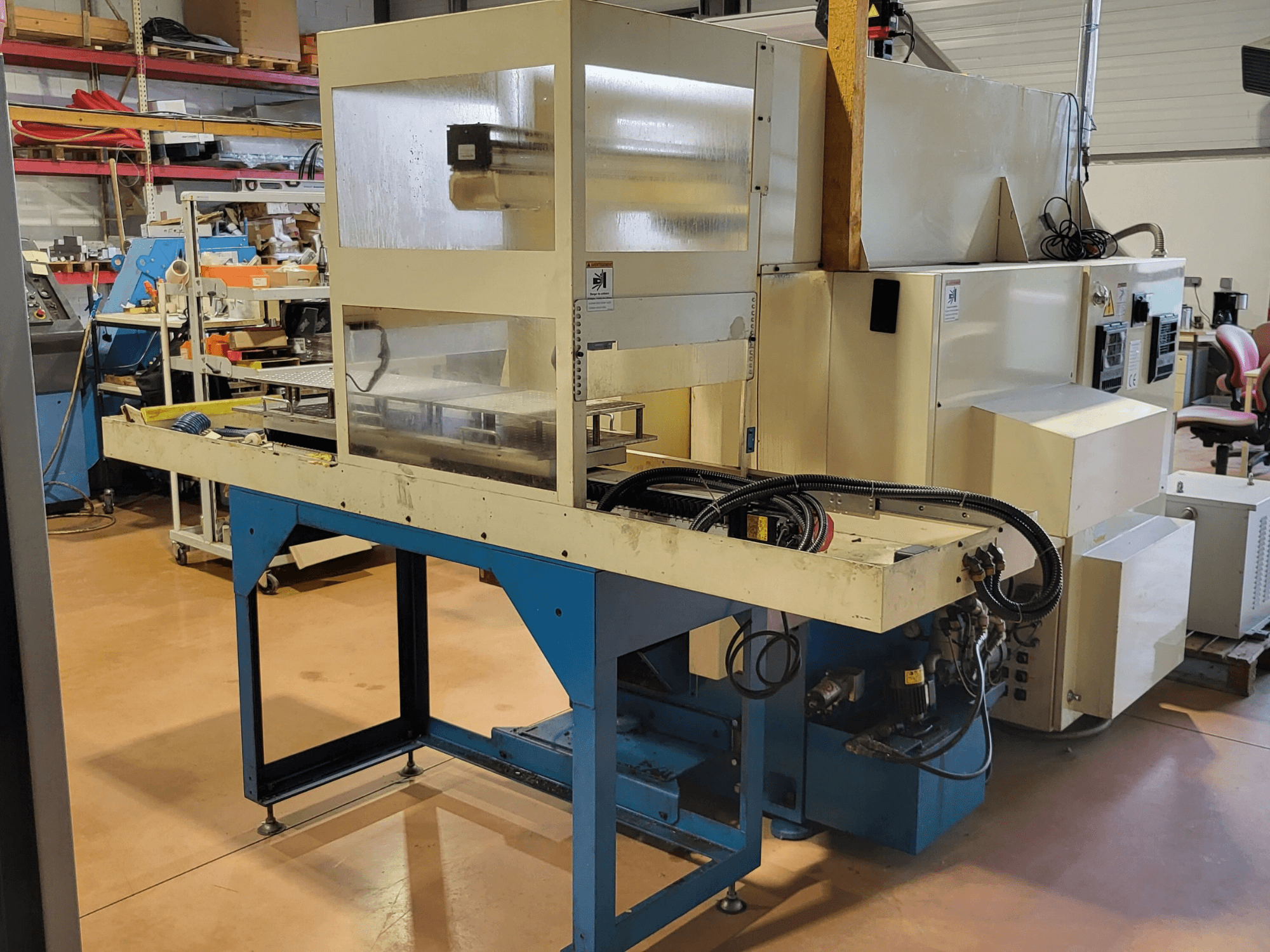 Kitamura KNC 150 NSA horizontal turning machine, side view showing control panel and operational setup in workshop.