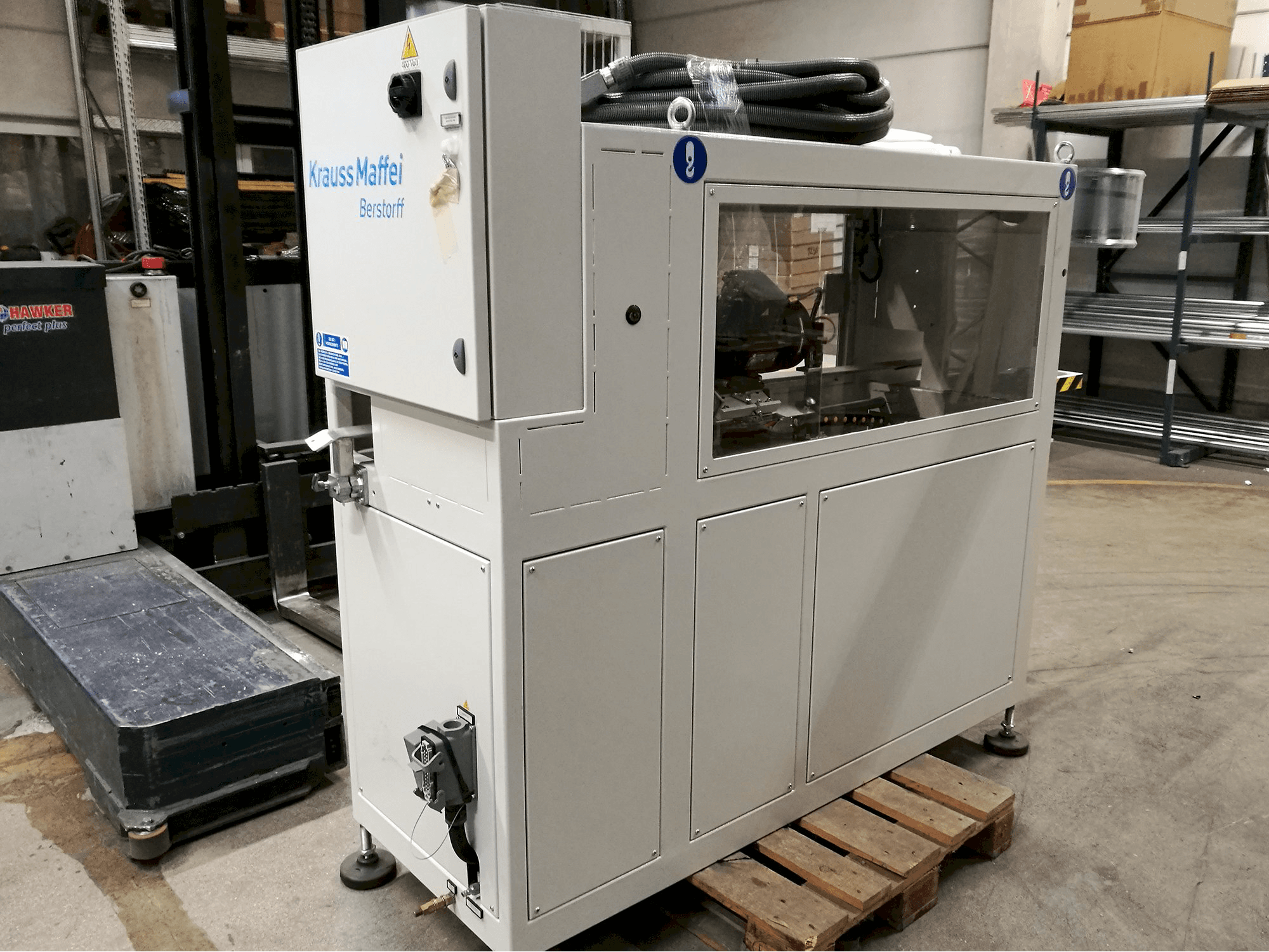 Left view of Krauss Maffei TL 63 Machine